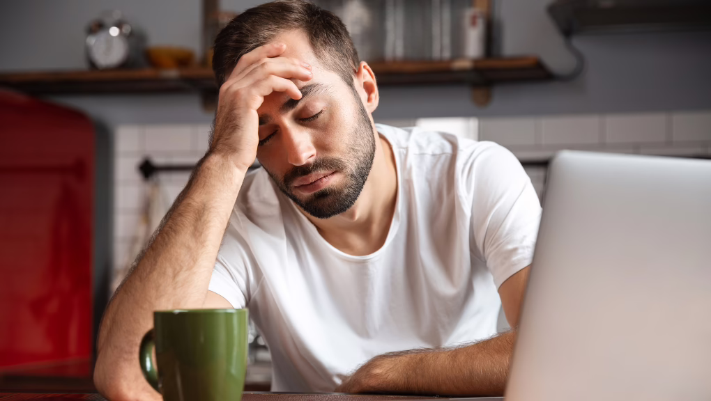 man looking tired