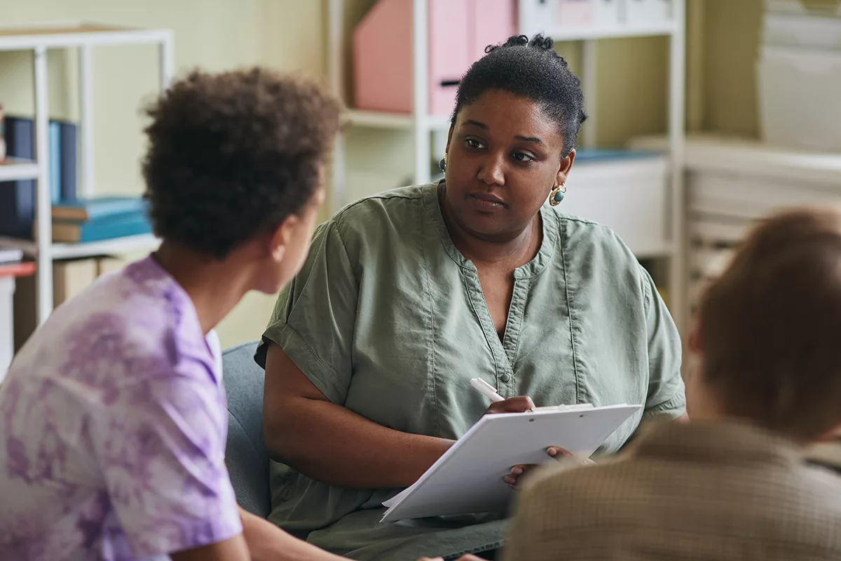 woman with people in a therapy group